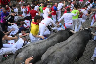 Fotos del quinto encierro de San Fermín 2026 en Pamplona