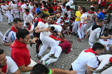 Fotos del quinto encierro de San Fermín 2026 en Pamplona