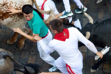 Fotos del quinto encierro de San Fermín 2026 en Pamplona