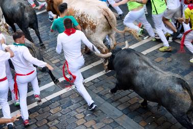 Fotos del quinto encierro de San Fermín 2026 en Pamplona
