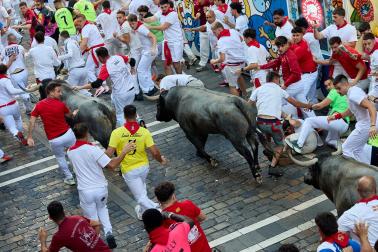Fotos del quinto encierro de San Fermín 2026 en Pamplona
