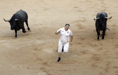 Fotos del quinto encierro de San Fermín 2026 en Pamplona