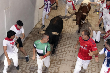 Fotos del sexto encierro de San Fermín 2026 en Pamplona