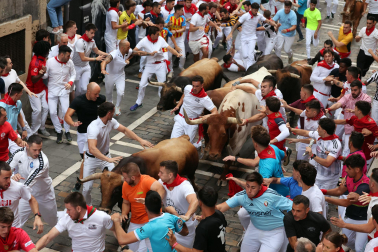 Fotos del sexto encierro de San Fermín 2026 en Pamplona