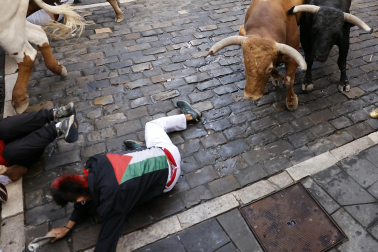 Fotos del sexto encierro de San Fermín 2026 en Pamplona