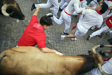 Fotos del sexto encierro de San Fermín 2026 en Pamplona