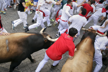 Fotos del sexto encierro de San Fermín 2026 en Pamplona