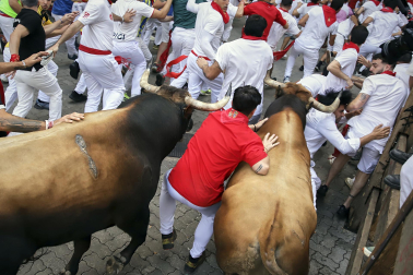 Fotos del sexto encierro de San Fermín 2026 en Pamplona