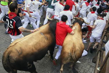 Fotos del sexto encierro de San Fermín 2026 en Pamplona