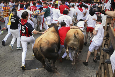 Fotos del sexto encierro de San Fermín 2026 en Pamplona