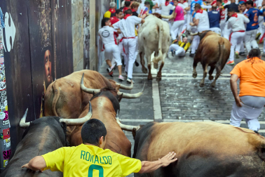 Fotos del sexto encierro de San Fermín 2026 en Pamplona