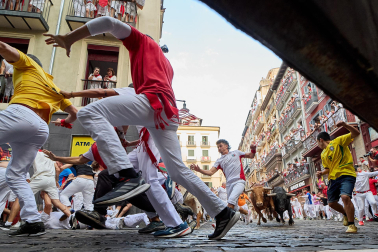 Fotos del sexto encierro de San Fermín 2026 en Pamplona