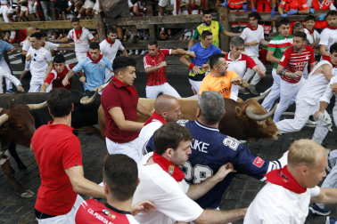 Fotos del sexto encierro de San Fermín 2026 en Pamplona