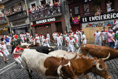 Fotos del sexto encierro de San Fermín 2026 en Pamplona