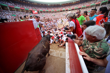 Fotos del sexto encierro de San Fermín 2026 en Pamplona