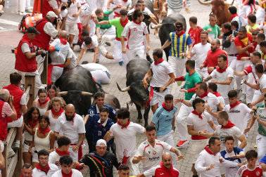 Fotos del séptimo encierro de San Fermín 2026 con toros de Miura.