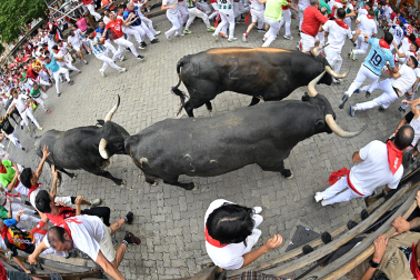 Fotos del séptimo encierro de San Fermín 2026 con toros de Miura.