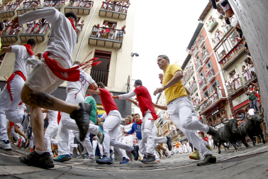 Fotos del séptimo encierro de San Fermín 2026 con toros de Miura.