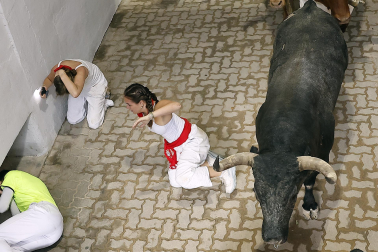 Fotos del séptimo encierro de San Fermín 2026 con toros de Miura.