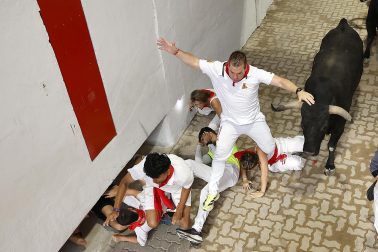 Fotos del séptimo encierro de San Fermín 2026 con toros de Miura.
