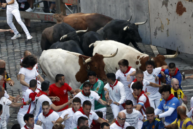 Fotos del octavo encierro de San Fermín 2026 con toros de la ganadería de Jandilla en Pamplona.