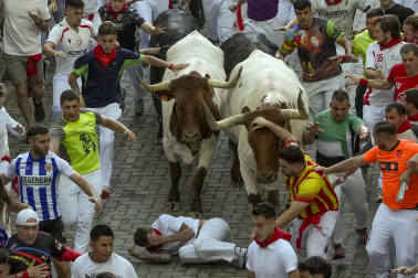 Fotos del octavo encierro de San Fermín 2026 con toros de la ganadería de Jandilla en Pamplona.