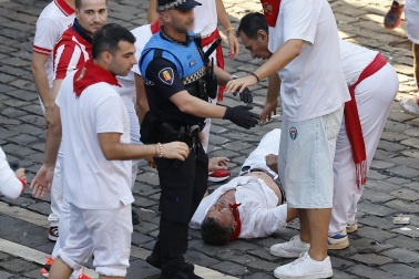 Fotos del octavo encierro de San Fermín 2026 con toros de la ganadería de Jandilla en Pamplona.