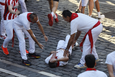 Fotos del octavo encierro de San Fermín 2026 con toros de la ganadería de Jandilla en Pamplona.