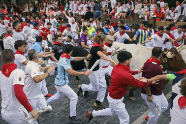 Fotos del octavo encierro de San Fermín 2026 con toros de la ganadería de Jandilla en el tramo de Telefónica.