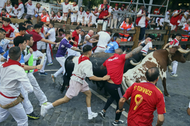 Fotos del octavo encierro de San Fermín 2026 con toros de la ganadería de Jandilla en el tramo de Telefónica.