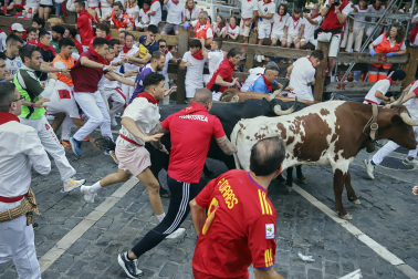Fotos del octavo encierro de San Fermín 2026 con toros de la ganadería de Jandilla en el tramo de Telefónica.