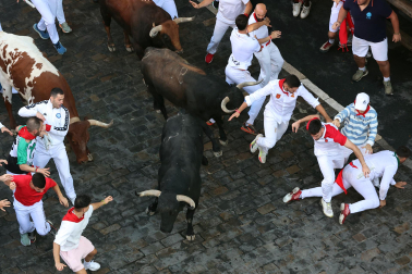 Fotos del octavo encierro de San Fermín 2026 con toros de la ganadería de Jandilla en el tramo de Telefónica.
