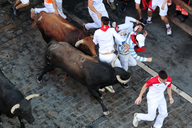 Fotos del octavo encierro de San Fermín 2026 con toros de la ganadería de Jandilla en el tramo de Telefónica.