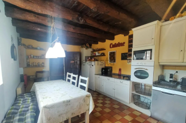 Cocina con vigas a la vista