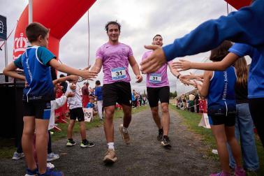 Fotos de la V Carrera por parejas 'Cada oveja con su pareja' en Zizur con la participación de 400 corredores