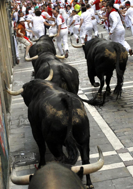 Imágenes del encierro del 12 de julio, con toros de Victoriano del Río