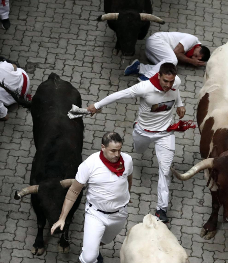Imágenes del séptimo encierro de los Sanfermines de 2018, con toros de la ganadería Jandilla.
