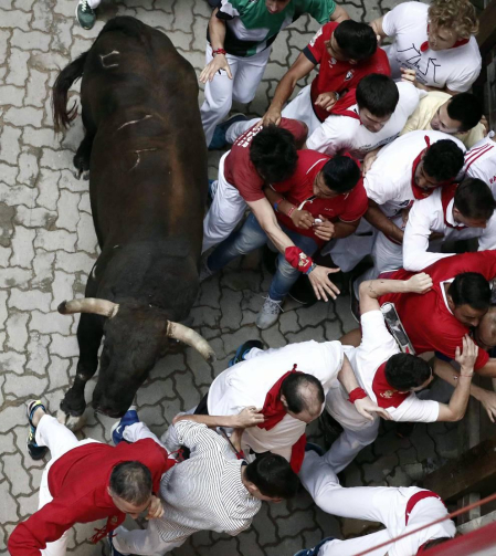 Imágenes del séptimo encierro de los Sanfermines de 2018, con toros de la ganadería Jandilla.
