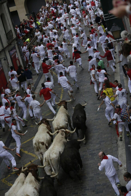Imágenes del séptimo encierro de los Sanfermines de 2018, con toros de la ganadería Jandilla.