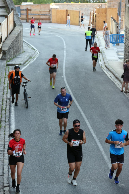 Fotos de La Media San Fermín 2023.