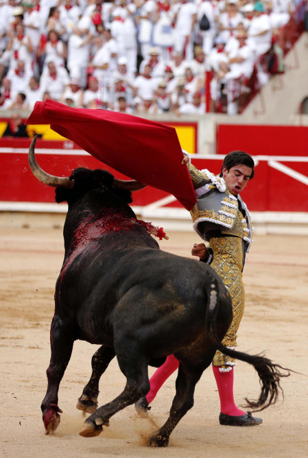 Fotos de la octava y última corrida de la Feria de San Fermín./