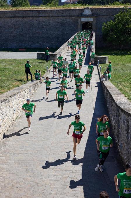Fotos de la X Marcha contra el Cáncer en Pamplona.