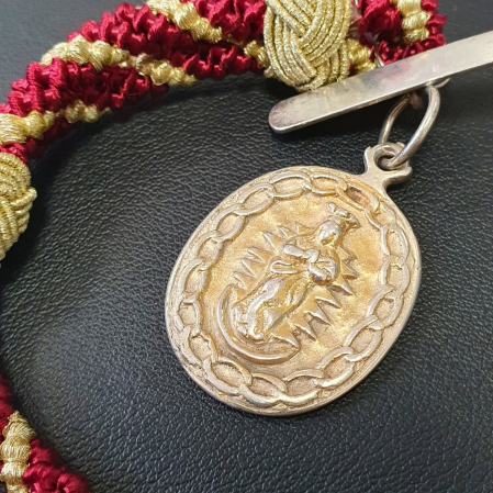 Reverso de la medalla sangüesina, dedicado a la Inmaculada