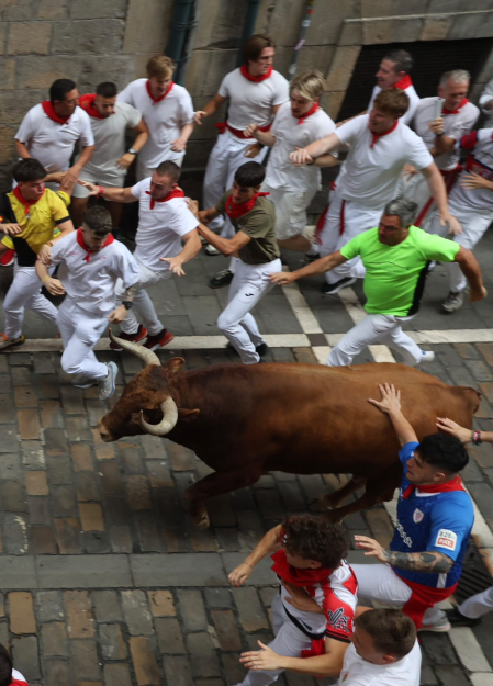 Fotos del cuarto encierro de San Fermín 2026 en Pamplona