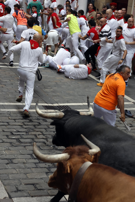 Fotos del séptimo encierro de San Fermín 2026 con toros de Miura.