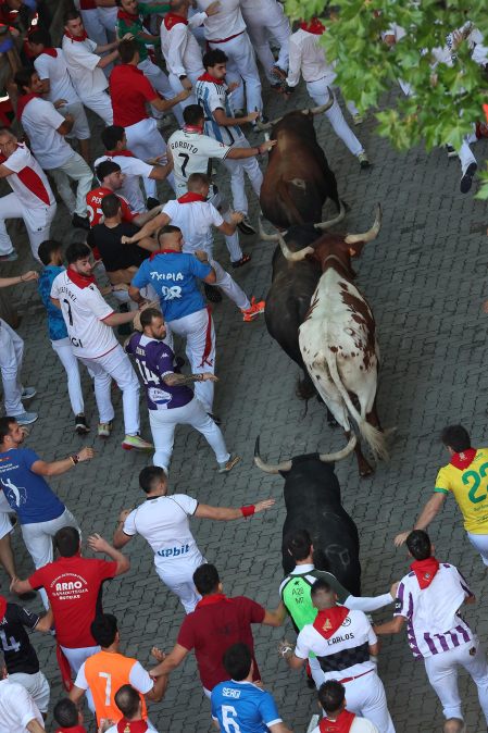 Fotos del octavo encierro de San Fermín 2026 con toros de la ganadería de Jandilla en el tramo de Telefónica.