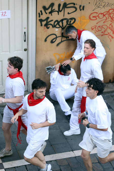 Fotos del octavo encierro de San Fermín 2026 con toros de la ganadería de Jandilla en la calle Estafeta.