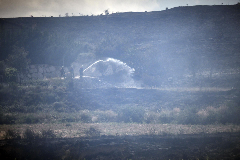 Fotos de los incendios activos en Navarra este domingo.