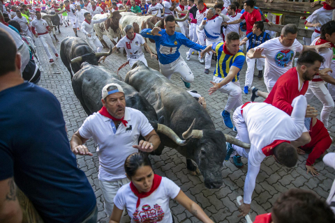 Fotos del tercer encierro de San Fermín 2022