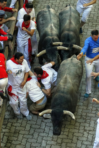 Fotos del tercer encierro de San Fermín 2022